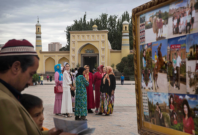 Uyghur Women Outside Shrine
